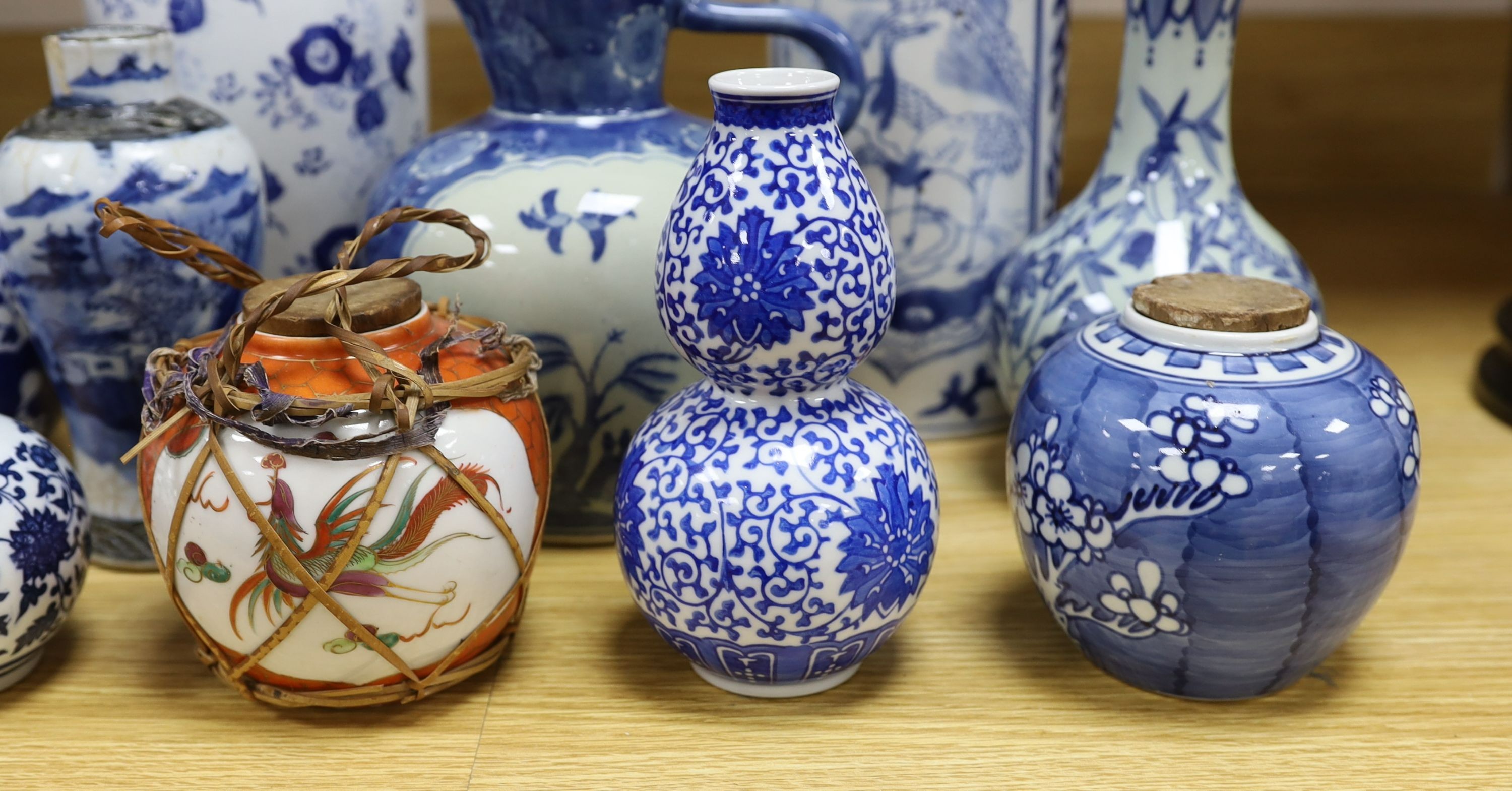 A group of Chinese blue and white porcelain including an early 20th century vase, tallest 28cm